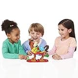 Hasbro Gaming Juego ¡Tozudo! - El Juegos de Equilibrio con un Burrito con Mucho Genio - Juego de Mesa Familiar de 2 a 4 Jugadores - Mayores de 4 Años